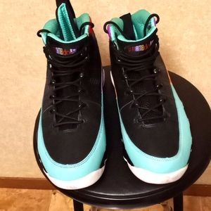 Jordan's size 10 black leather turquoise inside,purple/ red great condition.
